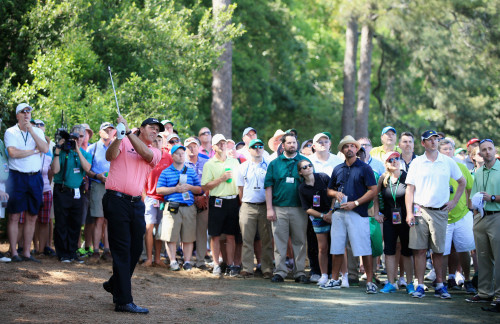 AUGUSTA, GA - APRIL 11:  Patrons watch as Phil Mickelson of the United States hits a shot on the fifth hole during the third round of the 2015 Masters Tournament at Augusta National Golf Club on April 11, 2015 in Augusta, Georgia.  (Photo by David Cannon/Getty Images)