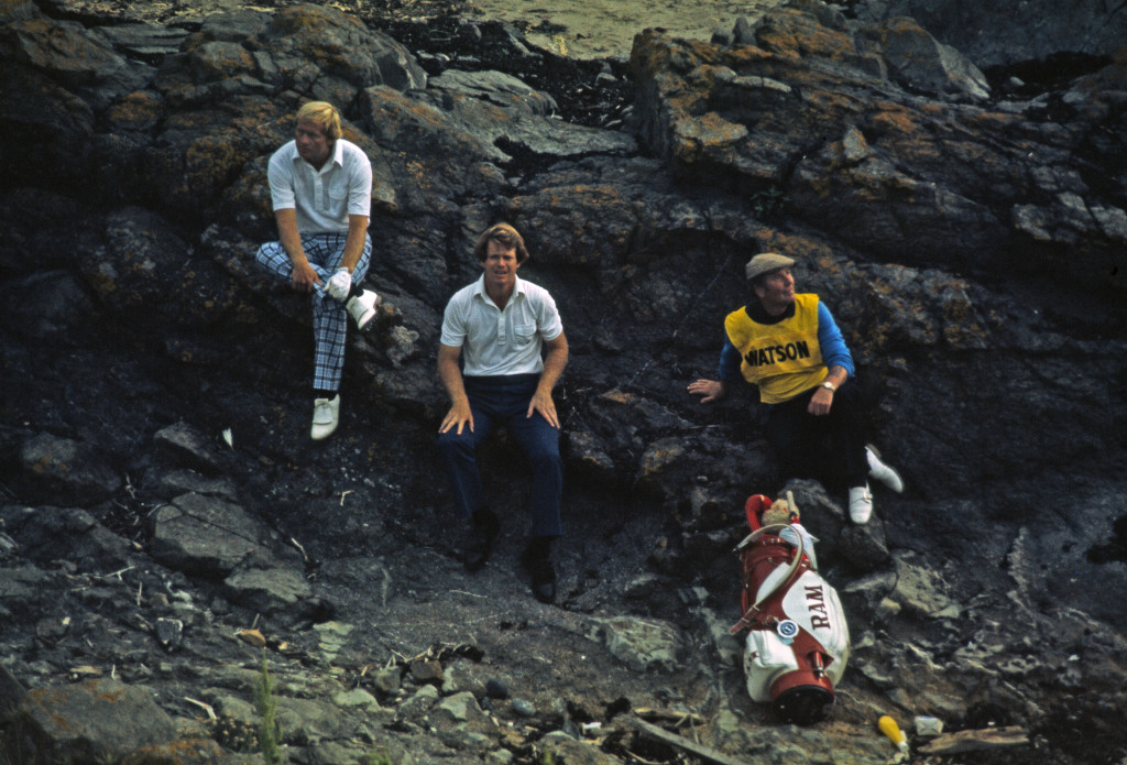 TURNBERRY, SCOTLAND- JULY 1977:  Jack Nicklaus of the USA and Tom Watson of the USA shelter from a storm on the final day of the British Open held at Turnberry Golf Club on July 9 1977 in Ayr, Scotland. (Photo by Don Morley/Getty Images)