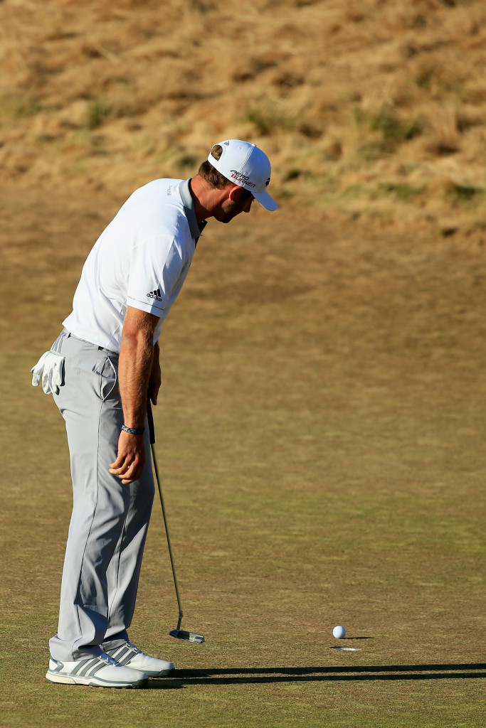 UNIVERSITY PLACE, WA - JUNE 21:  Dustin Johnson of the United States watches his missed birdie putt on the 18th green during the final round of the 115th U.S. Open Championship at Chambers Bay on June 21, 2015 in University Place, Washington.  (Photo by David Cannon/Getty Images)
