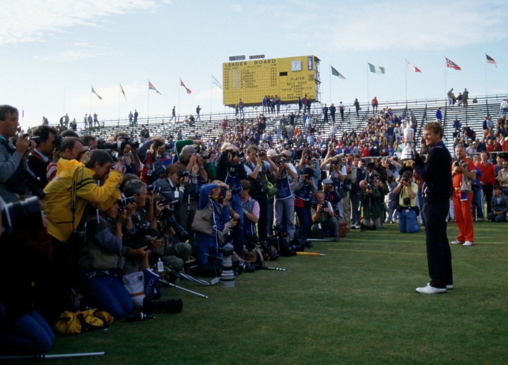 Sandy Lyle holds the Claret Jug trophy after winning the The Open in 1985 (Photo by Simon Bruty/Getty Images)