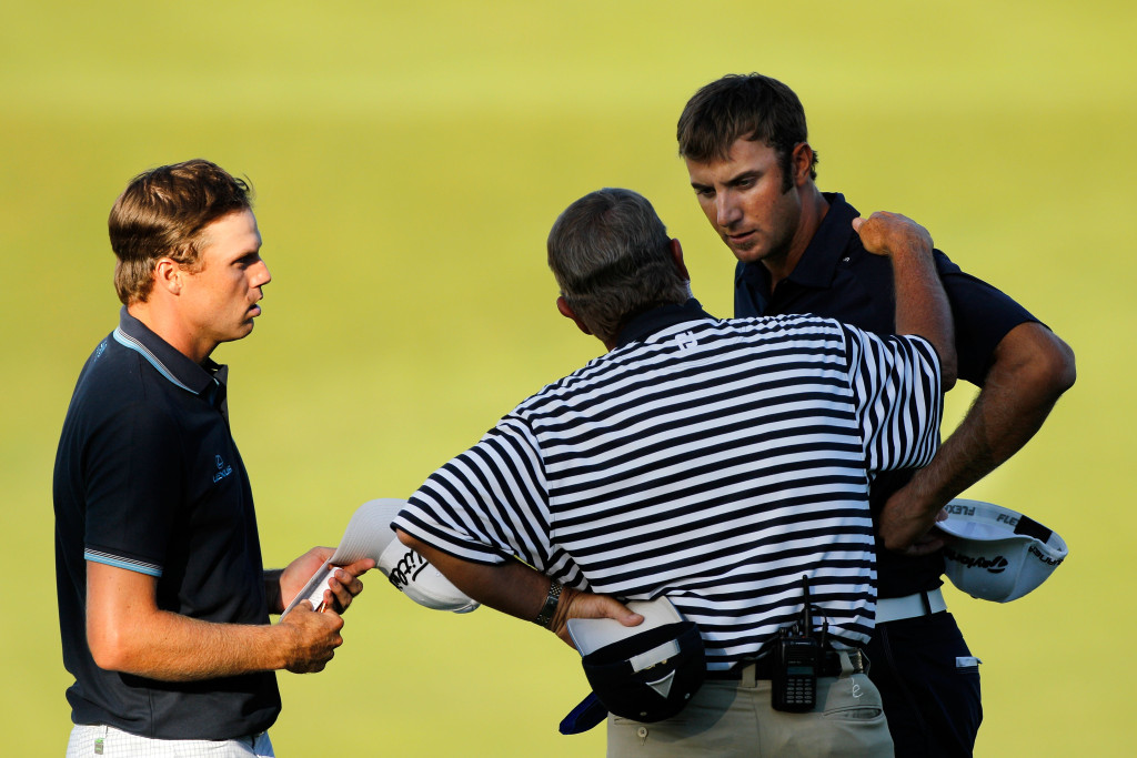 An official tells Johnson of his earlier infringement in 2010 (Photo by Sam Greenwood/Getty Images)