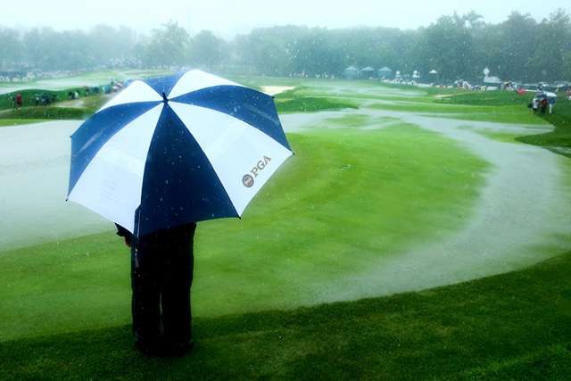 Talent spotting: The likes of Hugh Grant and Michael Douglas play at the Dunhill... if you can spot them underneath the layers (Photo by Getty Images)