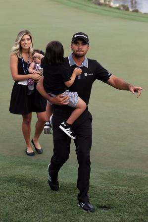 Family man: Day showed the importance of his wife and children by bringing his son to the winner's press conference (photo by Getty)