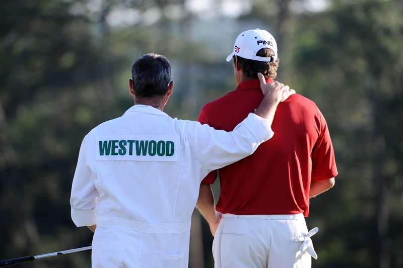 So near, yet so far: LEe Westwood is consoled by his caddie Billy Foster after finishing second at the 2010 Masters  (photo by Getty Images)