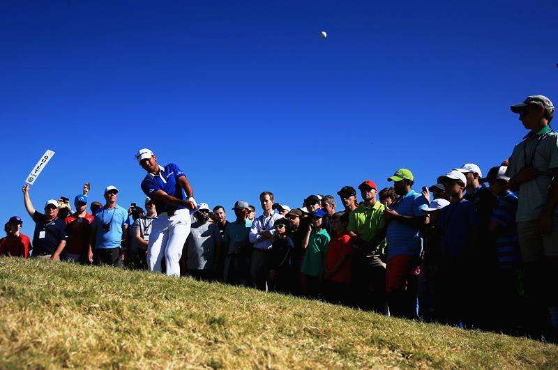 On target: Jason Day hits a pitch shot on the 12th hole of the final at the Dell Match Play (photo by Getty Images)