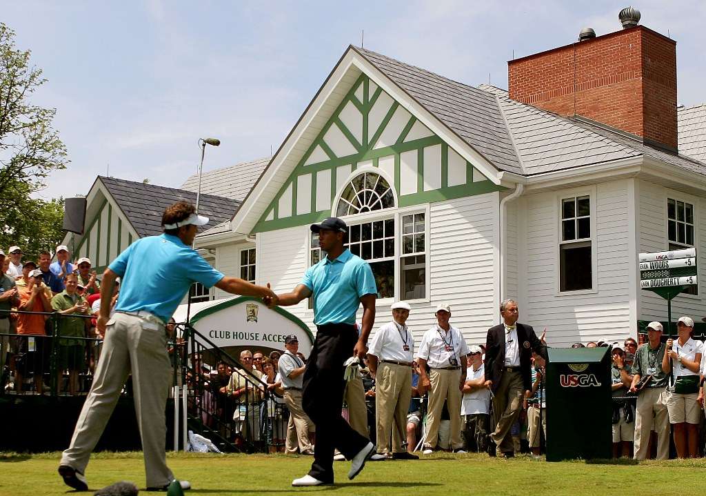 Seconds out, round three: Dougherty and Woods on the tee before Saturday's play in 2007 (photo by Getty Images)