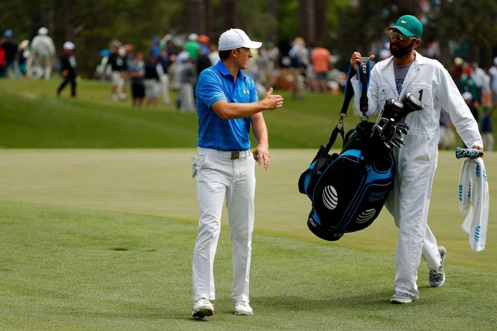 Painstaking: Jordan Spieth and his caddie Michael Greller discuss club selection