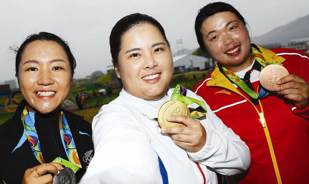 (Photo by Getty Images) Top trio: Silver medalist, Lydio Ko of New Zealand, left. with gold medalist, Inbee Park, of Korea, and brozne medalist Shanshan Feng, of China