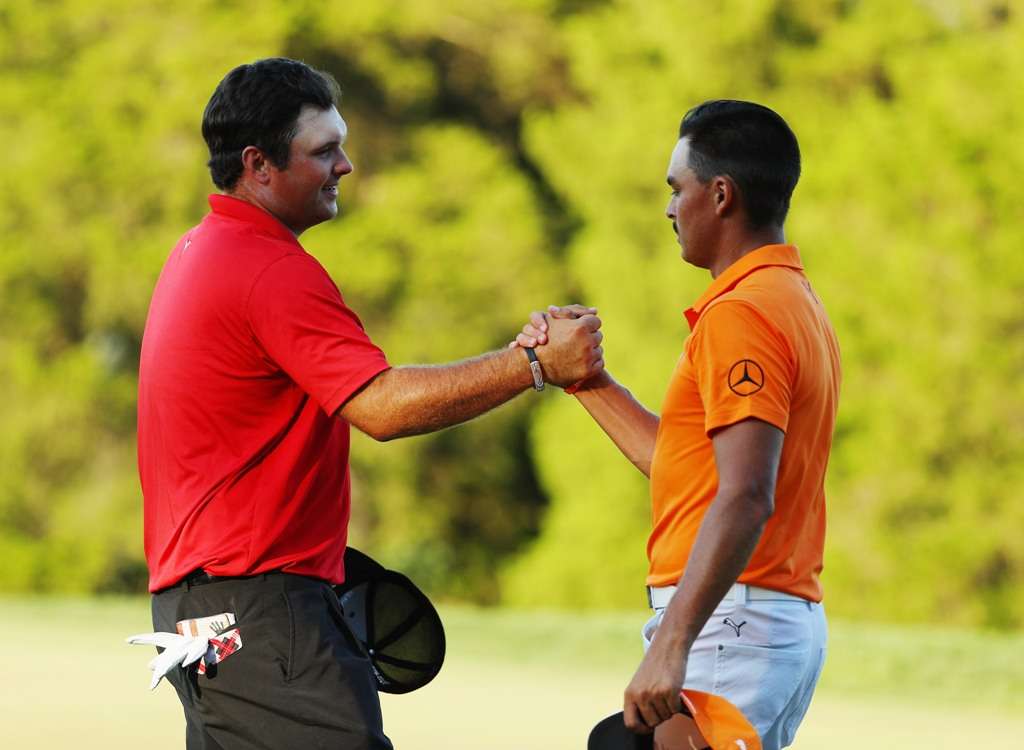 Best wishes: Patrick Reed, left, says that he is confident Rickie Fowler will earn his place (Photo by Getty Images)